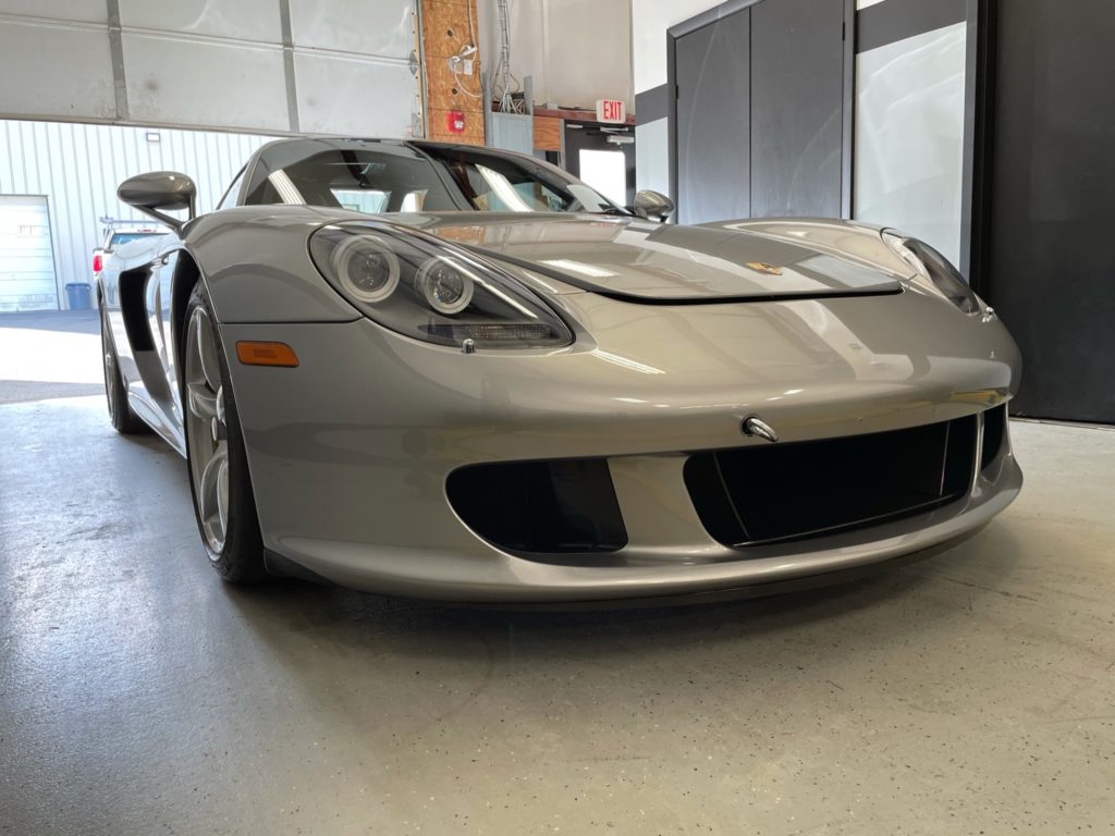 2005 Porsche Carrera GT | GT Silver / Dark Grey. 6,900 miles from new.