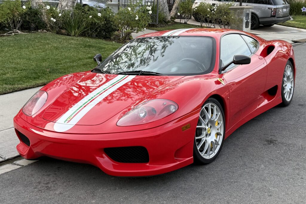 2004 Ferrari 360 Challenge Stradale | Rosso Corsa with factory stripe. 16k miles, highly optioned with full leather interior.