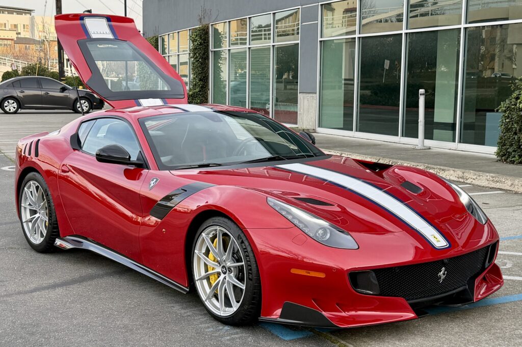 2016 Ferrari F12tdf | 1,200 miles, Rosso Berlinetta over Black, extensive carbon options.